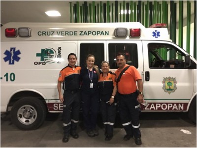 Ashleigh with the paramedic crew at the green cross emergency ambulance